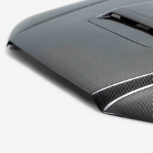 Load image into Gallery viewer, Seibon 12-15 Toyota Tacoma TR-Style Carbon Fiber Hood - Installation View