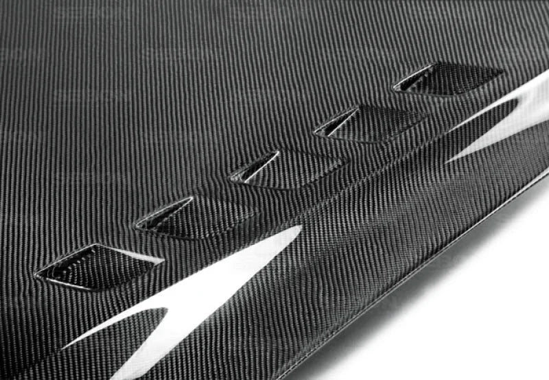 Seibon 14-20 Lexus IS250/IS300 BT Style Carbon Fiber Hood - Side View