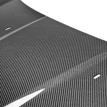 Load image into Gallery viewer, Seibon 14+ Ford Fiesta OE Style Carbon Fiber Hood - Installation View