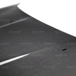 Load image into Gallery viewer, Seibon 15-16 Ford Focus OE Style Carbon Fiber Hood - Side View
