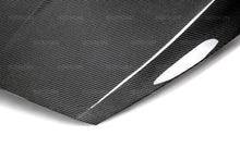 Load image into Gallery viewer, Seibon 15-16 Ford Focus OE Style Carbon Fiber Hood - Back View