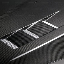 Load image into Gallery viewer, Seibon 15-17 Ford Focus TV-Style Carbon Fiber Hood - Additional View 6