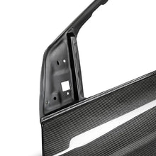 Load image into Gallery viewer, Seibon 16-18 Ford Focus Carbon Fiber Front Doors - Installation View