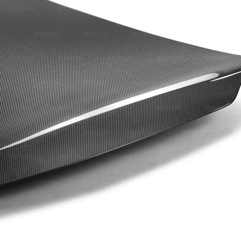 Seibon 17-19 Infiniti Q60 OE-Style Carbon Fiber Hood - Side View
