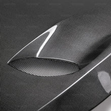 Load image into Gallery viewer, Seibon 17-19 Infiniti Q60 TSII-Style Carbon Fiber Hood - Side View
