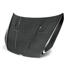 Load image into Gallery viewer, Seibon 2012+ Volkswagen Golf MK7 TM-Style Carbon Fiber Hood - Side View