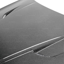 Load image into Gallery viewer, Seibon 2012+ Volkswagen Golf MK7 TM-Style Carbon Fiber Hood - Installation View