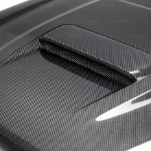 Load image into Gallery viewer, Seibon 2018+ Toyota Tacoma TR-Style Carbon Fiber Hood - Installation View