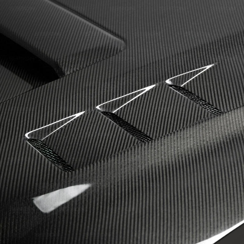 Seibon 2018+ Toyota Tacoma TS-Style Carbon Fiber Hood - Side View