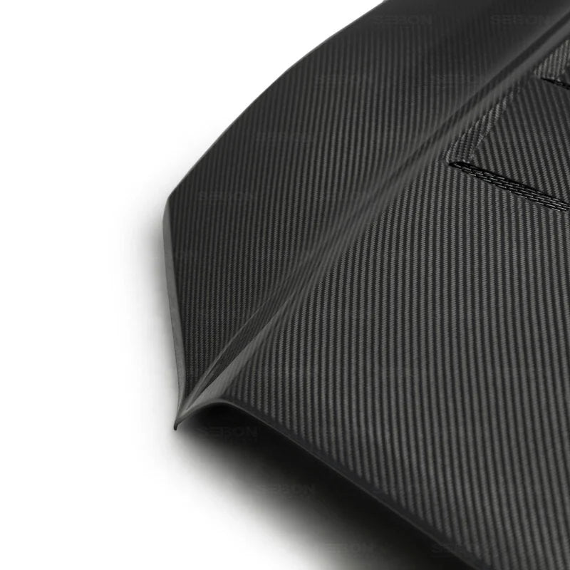 Seibon 2018+ Toyota Tacoma TS-Style Carbon Fiber Hood - Back View