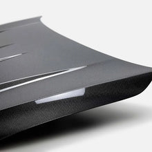Load image into Gallery viewer, Seibon 2022-2023 Volkswagen Golf GTI/R DV-Style Carbon Fiber Hood - Back View