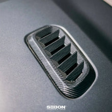 Load image into Gallery viewer, Seibon 2023 Toyota GR Corolla Carbon Fiber Hood Vents - Installation View