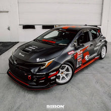 Load image into Gallery viewer, Seibon 2023 Toyota GR Corolla VS-Style Double-Sided Carbon Hood  - Gloss Finish - Side View