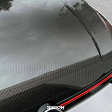Load image into Gallery viewer, Seibon 22-23 Volkswagen Golf GTI/R OEM Style Carbon Fiber Hood - Installation View