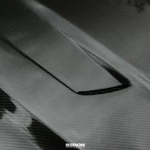 Load image into Gallery viewer, Seibon 22-23 Volkswagen Golf GTI/R  TM-Style Carbon Fiber Hood - Side View
