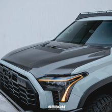 Load image into Gallery viewer, Seibon 22-24 Toyota Tundra / 23-24 Toyota Sequoia RR-Style Carbon Fiber Hood - Installation View