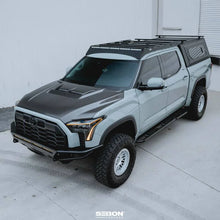 Load image into Gallery viewer, Seibon 22-24 Toyota Tundra / 23-24 Toyota Sequoia RR-Style Carbon Fiber Hood - Additional View 12