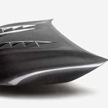 Load image into Gallery viewer, Seibon 23-25 Toyota Corolla GR TV-Style Double-Sided Carbon Fiber Hood - Main Product View