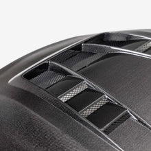 Load image into Gallery viewer, Seibon 23-25 Toyota Corolla GR TV-Style Double-Sided Carbon Fiber Hood - Side View