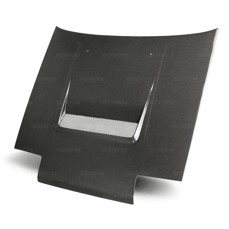 Seibon 84-87 Toyota Corolla (AE86) DV Style Carbon Fiber Hood - Side View