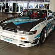 Load image into Gallery viewer, Seibon 89-94 Nissan S13/Silvia OEM Carbon Fiber Hood - Side View