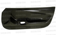 Load image into Gallery viewer, Seibon 93-98 Toyota Supra Carbon Fiber Door Panels (Pair) - Installation View
