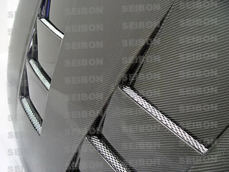 Seibon 93-98 Toyota Supra (JZA80L) TS Style Carbon Fiber Hood - Side View