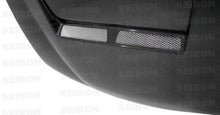 Load image into Gallery viewer, Seibon 97-98 Nissan 240SX/Silvia TA-Style Carbon Fiber Hood - Detail View