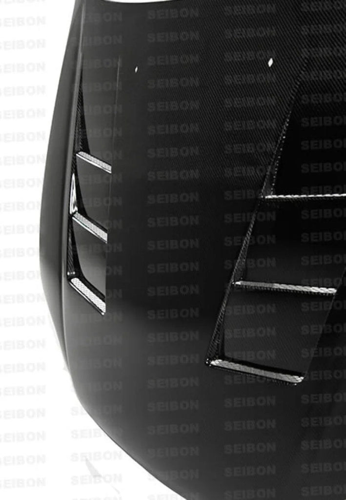 Seibon 99-00 Honda Civic (EM1/EJ6/7/8/EK9) TS-Style Carbon Fiber Hood - Side View
