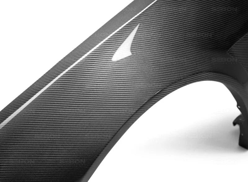 Seibon 99-01 Nissan Skyline R34 NSW-Style Carbon Fiber (Gloss Finish) Fenders (Pair) - Back View
