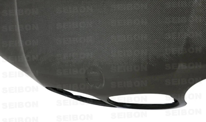 Seibon 02-05 BMW E46 2dr OE Carbon Fiber Hood - Side View