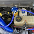 Load image into Gallery viewer, Sinister Diesel 11-16 Ford Powerstroke 6.7L (Engine Mount) Coolant Filtration System - Side View
