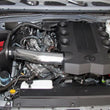 Load image into Gallery viewer, Spectre 10-18 Toyota FJ 10-15 4Runner V6-4.0L F/I Air Intake Kit - Polished w/Red Filter - Back View