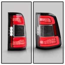 Load image into Gallery viewer, Spyder Apex 19-23 Dodge Ram 1500 (w/ Factory LED) LED Tail Light - Black (ALT-YD-DR19LEDT2-SEQ-BK) - Back View
