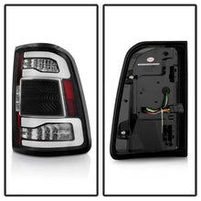 Load image into Gallery viewer, Spyder Apex 19-23 Dodge Ram 1500 (w/ Factory LED) LED Tail Light - Black (ALT-YD-DR19LEDT2-SEQ-BK) - Installation View