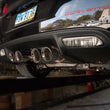 Load image into Gallery viewer, Stainless Works 2009-13 C6 Corvette Axleback 2-1/2in Dual Chambered Turbo Mufflers Quad 4in Tips - Additional View 5