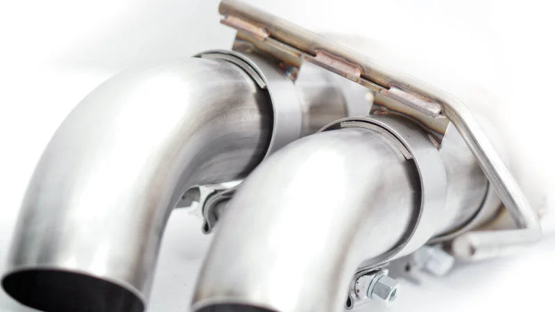 Stainless Works 2010-14 Ford Raptor 3in Exhaust Chambered Mufflers Dump Exit - Side View