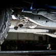 Load image into Gallery viewer, Stainless Works 2011-14 Ford F-150 Raptor Exhaust X-Pipe Resonator Dump In Front Of Rear Axle - Installation View