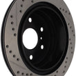 Load image into Gallery viewer, StopTech 05-10 GMC Sierra (w/ Rear Drum) / 07-09 GMC Yukon Rear Right Slotted &amp; Drilled Rotor - Side View