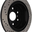 Load image into Gallery viewer, StopTech 07-10 GMC Sierra (w/ Rear Drum) / 07-09 GMC Yukon Rear Left Slotted &amp; Drilled Rotor - Side View