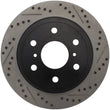 Load image into Gallery viewer, StopTech 07-10 GMC Sierra (w/ Rear Drum) / 07-09 GMC Yukon Rear Left Slotted &amp; Drilled Rotor - Installation View