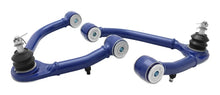 Load image into Gallery viewer, SuperPro 19-23 Chevrolet Silverado 1500 / GMC Sierra 1500 Upper Control Arm Set - Installation View