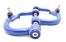 Load image into Gallery viewer, SuperPro 2005 Toyota Tacoma Pre Runner Front Upper Fixed Offset Control Arm Set - Side View