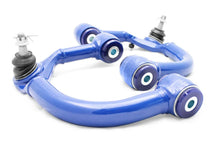 Load image into Gallery viewer, SuperPro 2005 Toyota Tacoma Pre Runner Front Upper Fixed Offset Control Arm Set - Back View
