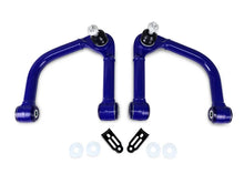 Load image into Gallery viewer, SuperPro 22-23 Toyota Tundra Fixed Offset Front Upper Control Arm Set - Side View