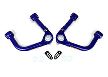 Load image into Gallery viewer, SuperPro 22-23 Toyota Tundra Fixed Offset Front Upper Control Arm Set - Back View