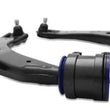 Load image into Gallery viewer, SuperPro 2004 Mazda 3 i Front Lower Control Arm Set w/ Bushings - Installation View