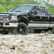 Load image into Gallery viewer, Superlift 05-07 Ford F-250/F-350 SD 4WD 6in Lift Kit w/Repl Radius Arms &amp; King Coilovers Rear Shocks - Side View