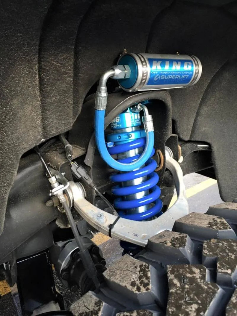 Superlift 07-16 Chevy Silv 4WD 8in Lift Kit w/ OE Cast Steel Control Arms & King Coilovers & Shocks - Side View