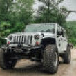 Load image into Gallery viewer, Superlift 07-18 Jeep Wrangler JK 4in Long Arm Kit - Bilstein Shocks - Installation View